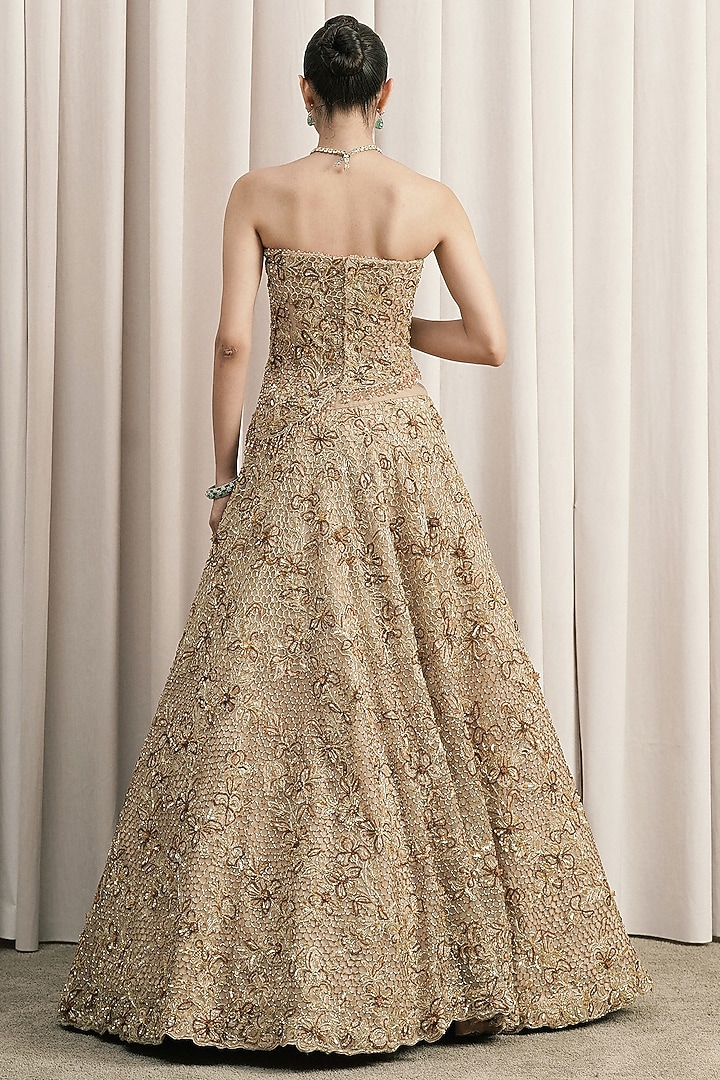 Beige Net Cutdana Hand Embroidered Fish-Cut Bridal Lehenga Set by ISTYA at Pernia's Pop Up Shop