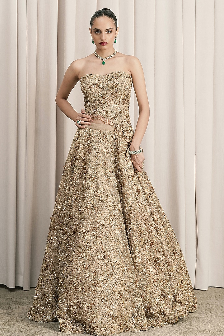 Beige Net Cutdana Hand Embroidered Fish-Cut Bridal Lehenga Set by ISTYA at Pernia's Pop Up Shop