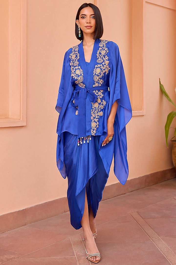 Blue Satin Draped Asymmetrical Skirt Set by Isha Gupta Tayal