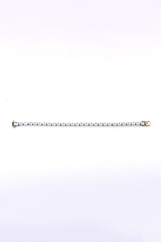Gold Finish Swarovski Tennis Bracelet In Sterling Silver by ITEE Jewellery
