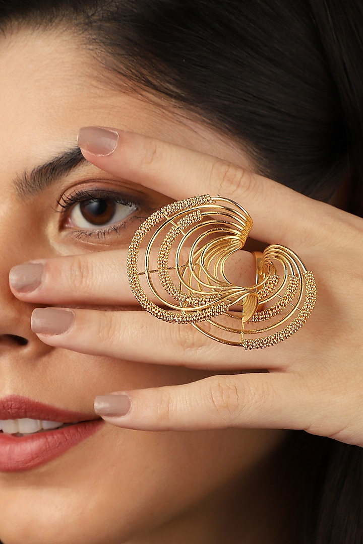 Yellow Gold Finish Twirl Ring by Itrana By Sonal Gupta