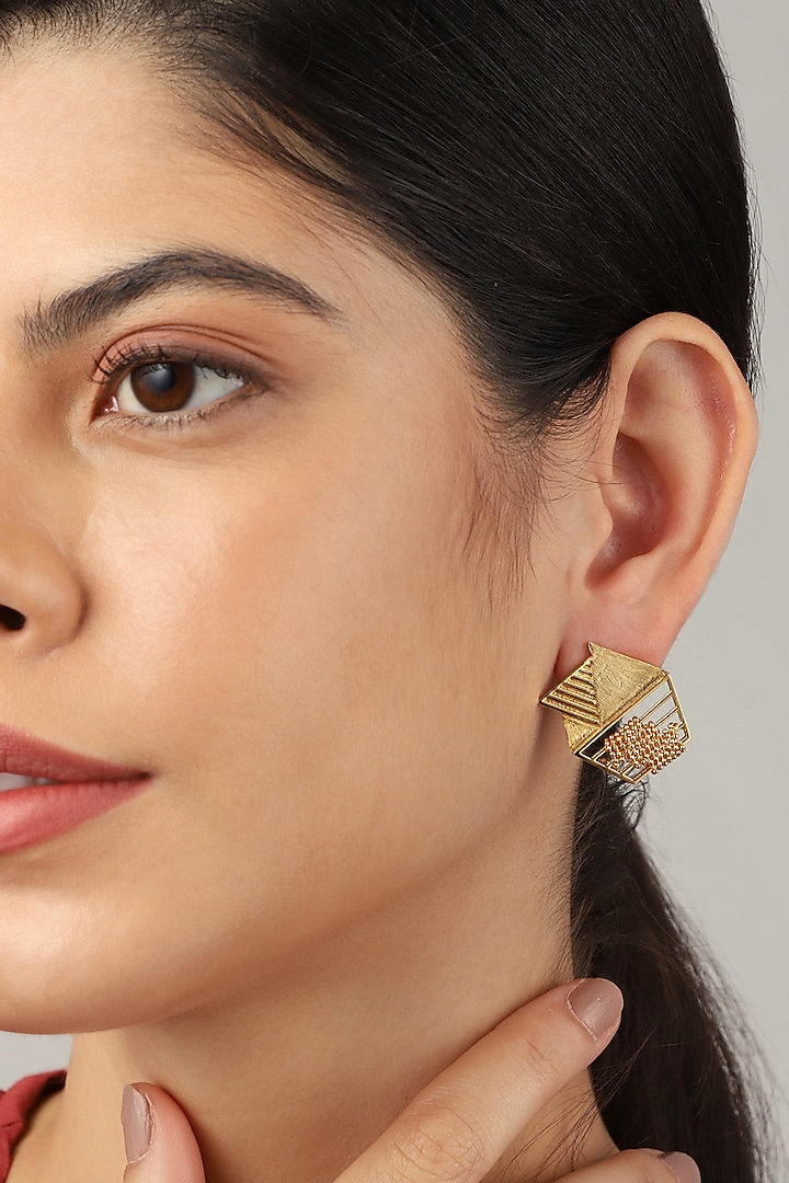 Yellow Gold Finish Hexagon Stud Earrings by Itrana By Sonal Gupta