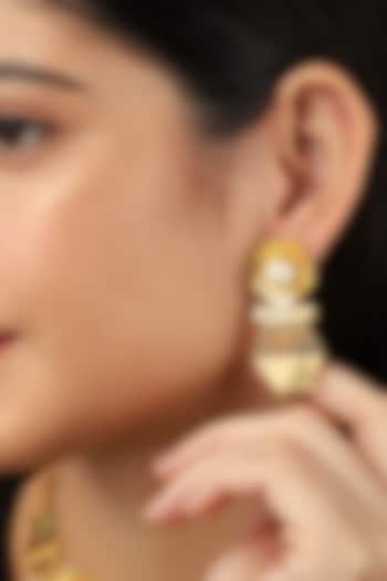 Yellow Gold Finish Half-Cut Cabochon Stud Earrings by Itrana By Sonal Gupta