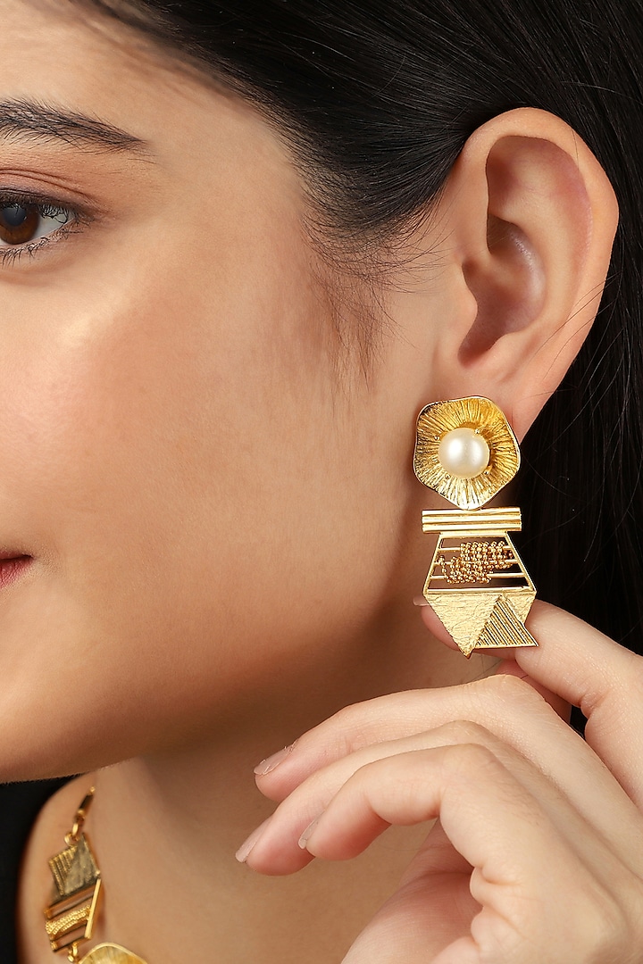 Yellow Gold Finish Half-Cut Cabochon Stud Earrings by Itrana By Sonal Gupta
