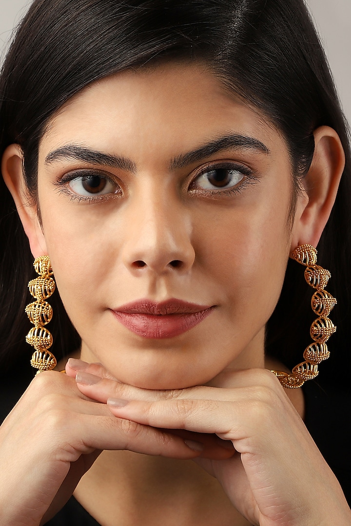 Yellow Gold Finish Orb Hoop Earrings by Itrana By Sonal Gupta
