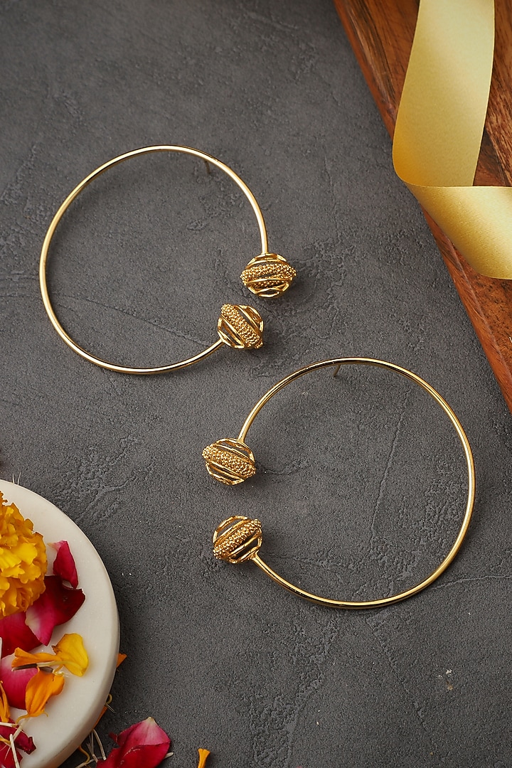 Yellow Gold Finish Minimal Hoop Earrings by Itrana By Sonal Gupta at Pernia's Pop Up Shop