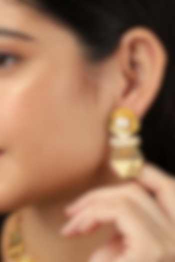 Gold Rhodium Finish Pearl Hexa Stud Earrings by Itrana By Sonal Gupta at Pernia's Pop Up Shop