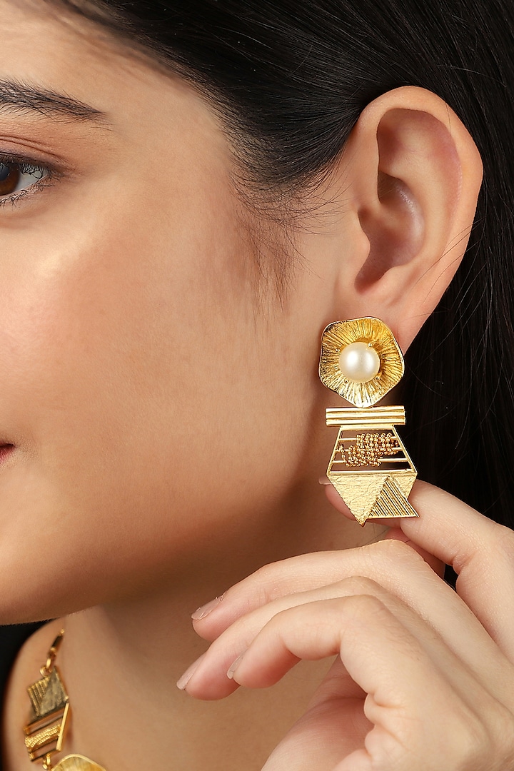 Gold Rhodium Finish Pearl Hexa Stud Earrings by Itrana By Sonal Gupta at Pernia's Pop Up Shop