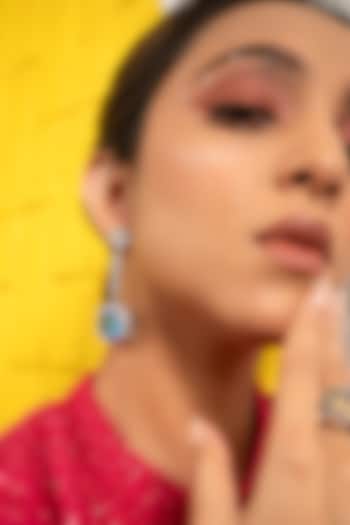 White Finish Sapphire Synthetic Stone Dangler Earrings In Sterling Silver by ITEE Jewellery at Pernia's Pop Up Shop