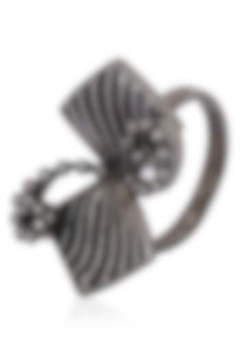Itrana by Sonal Gupta presents Black finish bow motif ring available only at Pernia's Pop Up Shop.
