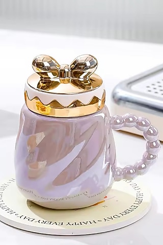 Purple Ceramic Mug by IZZHAAR