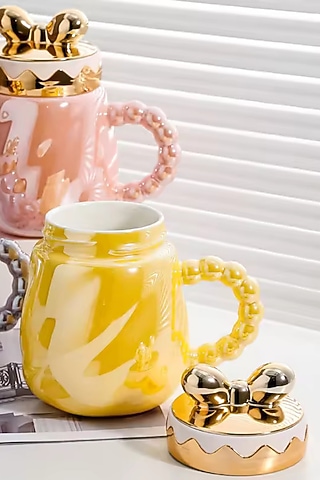 Yellow Ceramic Mug by IZZHAAR