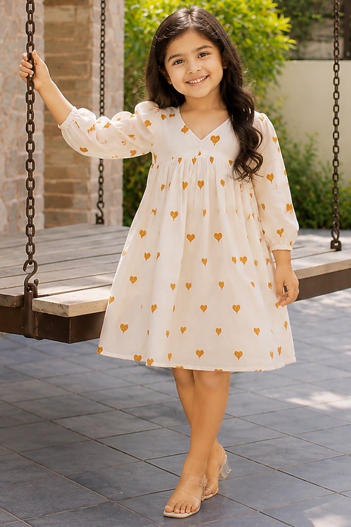 White & Mustard Kora Cotton Dress For Girls by House Of Jamoti Kids at Pernia's Pop Up Shop