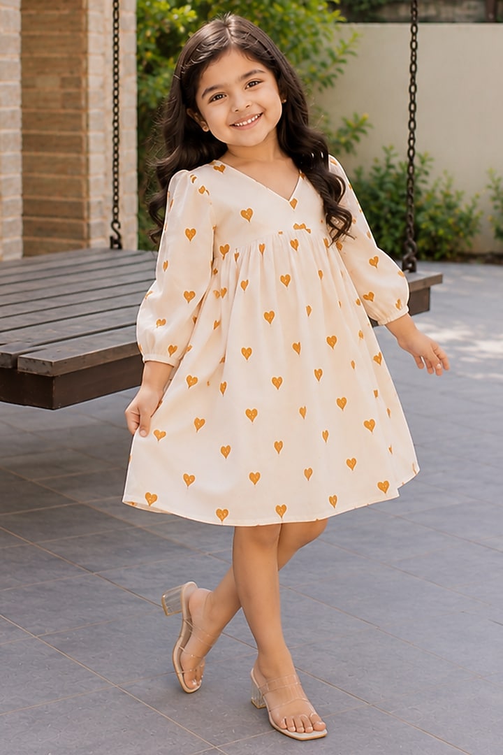 White & Mustard Kora Cotton Dress For Girls by House Of Jamoti Kids at Pernia's Pop Up Shop
