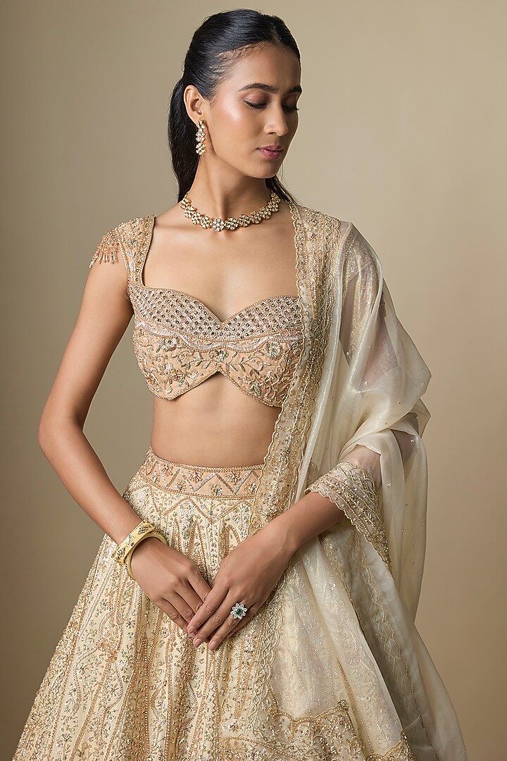 Beige Shimmer Raw Silk Crystal Embroidered Bridal Lehenga Set by Jayesh & Kaajal Shah at Pernia's Pop Up Shop