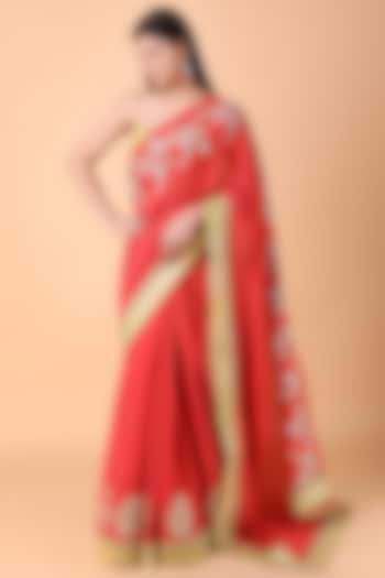 Carrot Colored Flat Chiffon Knotted Work Saree Set by Nidhi Kejriwal at Pernia's Pop Up Shop