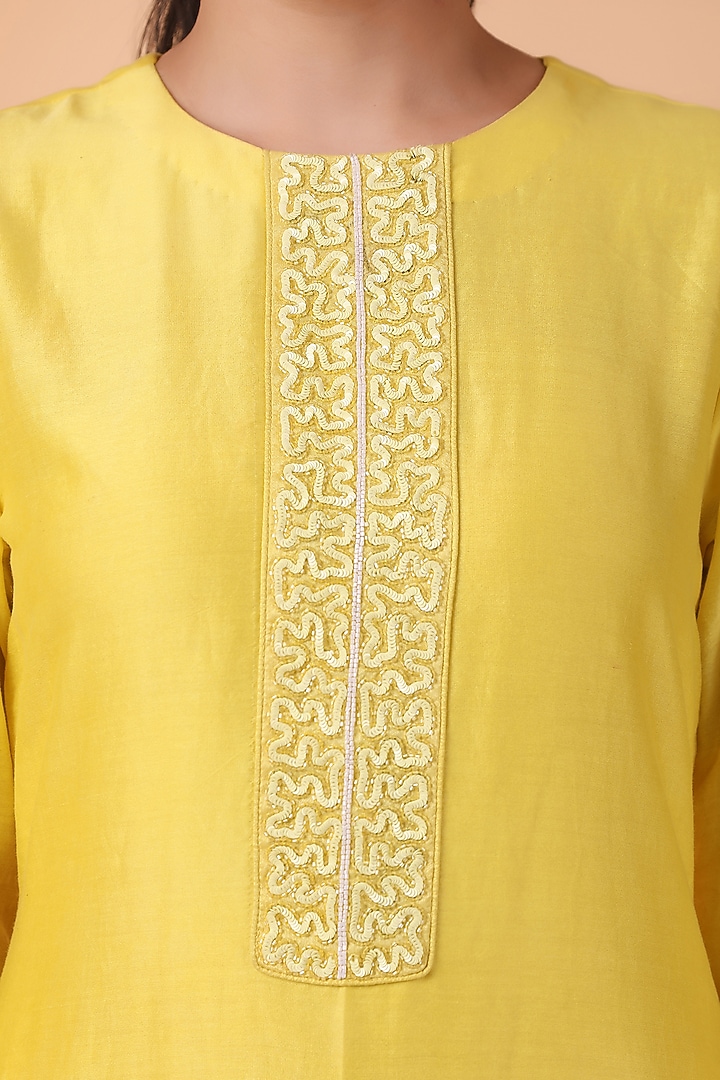 Yellow Chanderi Silk Cutwork Kurta Set by Nidhi Kejriwal at Pernia's Pop Up Shop