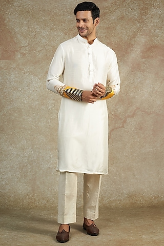 White Flat Raw Silk Hand & Machine Embroidered Kurta Set by JAMA ART OF DRESSING