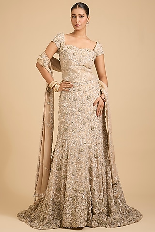 Golden Shimmer Tissue Sequins Embroidered Lehenga Set by jaya rathore