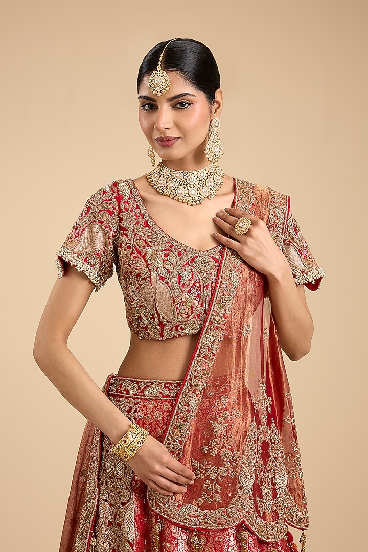 Red Brocade Cutwork Embellished Bridal Lehenga Set by Jaya Rathore at Pernia's Pop Up Shop