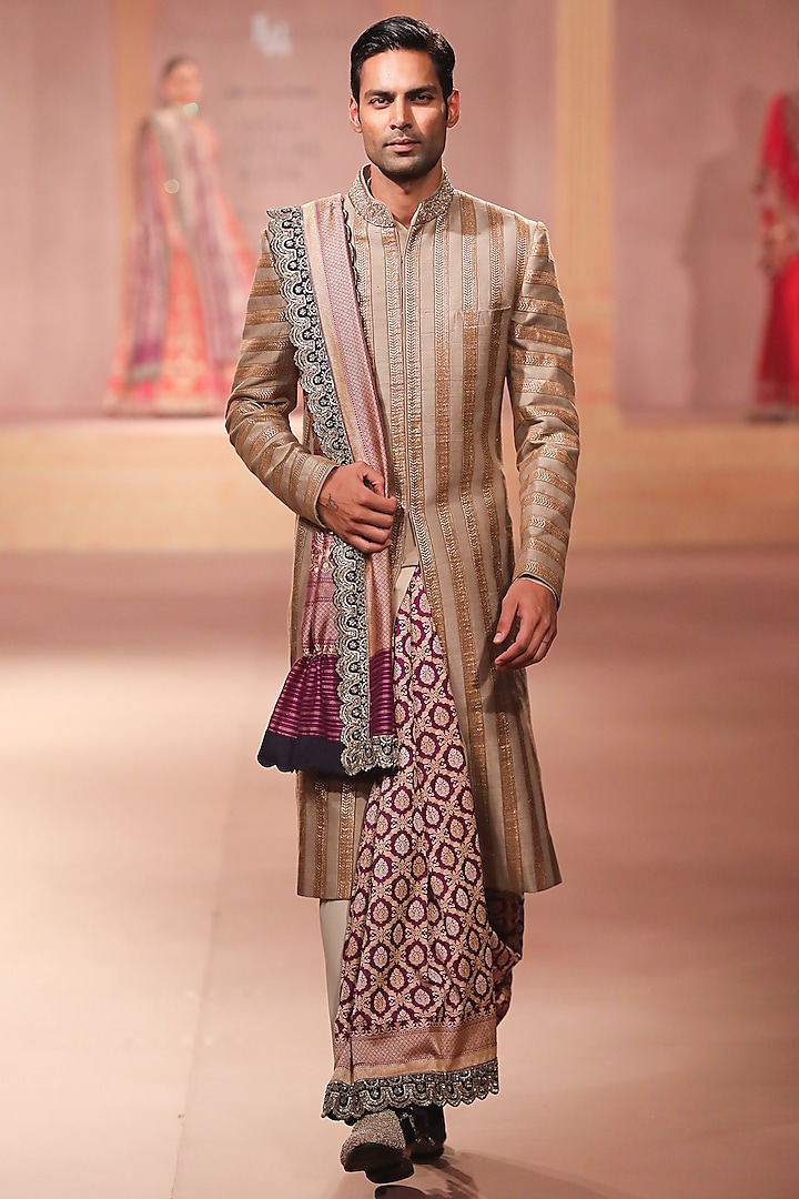 Gold Raw Silk Lace Embroidered Sherwani Set by JAYANTI REDDY MEN