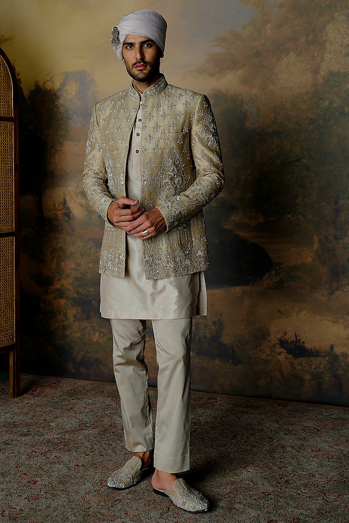 Beige Silk Zardosi Embroidered Bundi Jacket Set by JAYANTI REDDY MEN