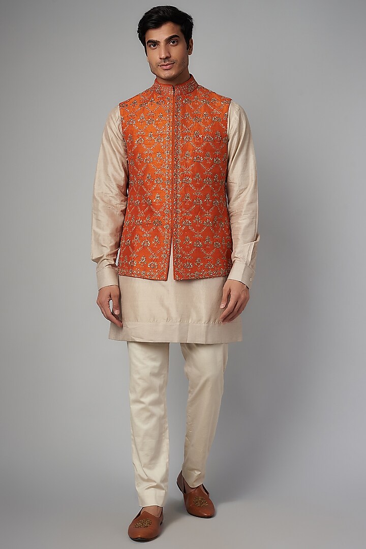 Orange Silk Embroidered Bundi Jacket Set by JAYANTI REDDY MEN