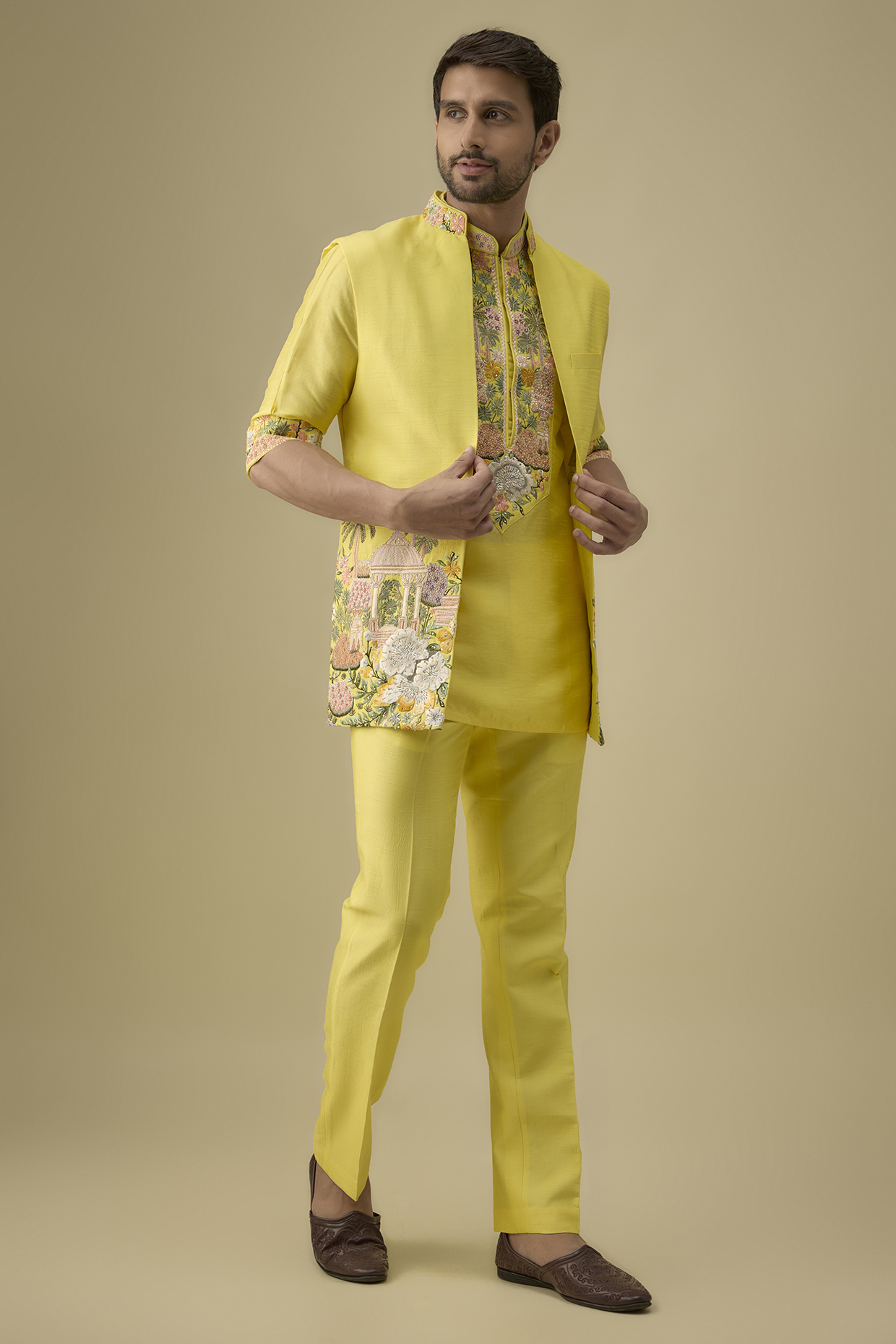 Yellow Spun Silk Embroidered Bundi Jacket Set by Jayesh and Kaajal Shah