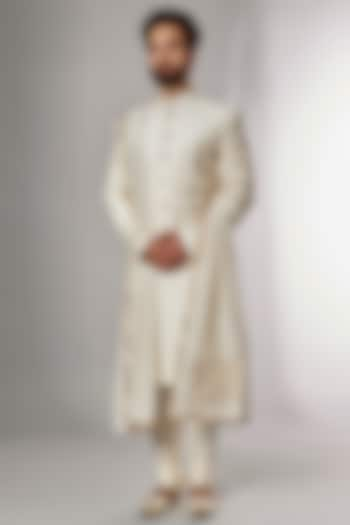 Cream Dupion Silk Sherwani Set by Jayesh and Kaajal Shah