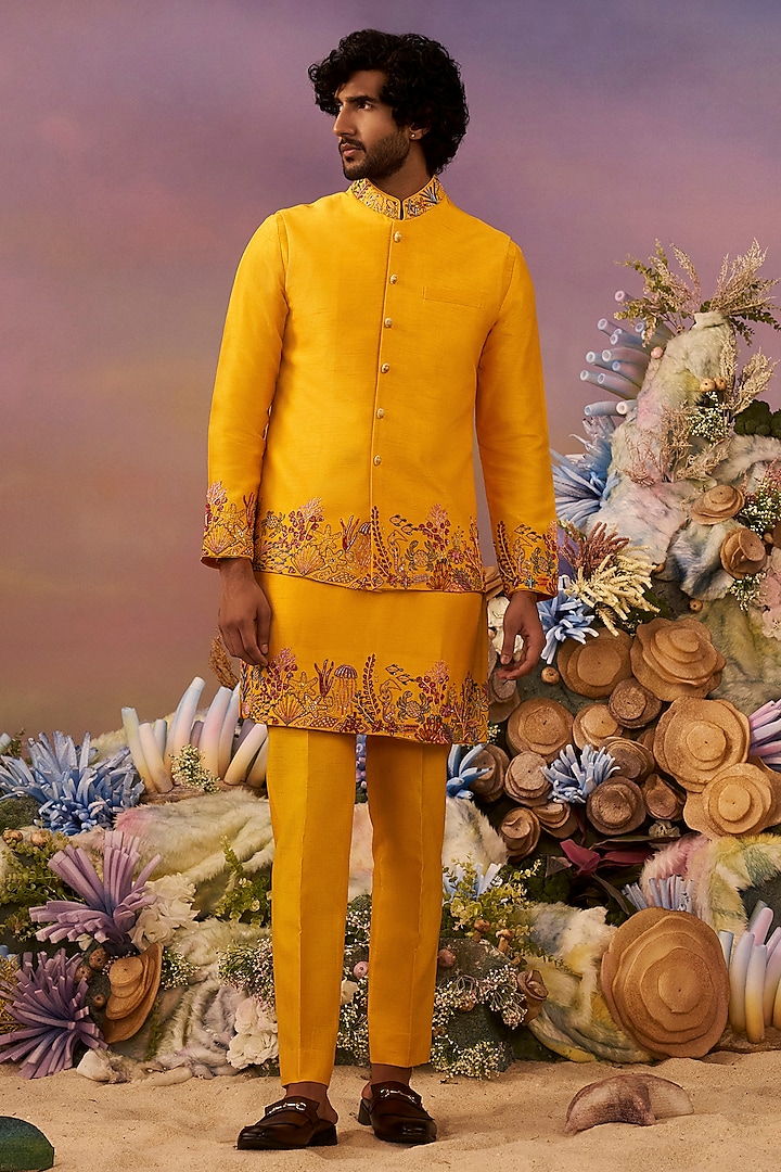 Yellow Raw Silk Daman Work Bundi Jacket Set by Jayesh and Kaajal Shah