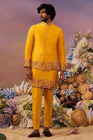Yellow Raw Silk Daman Work Bundi Jacket Set by Jayesh and Kaajal Shah Men