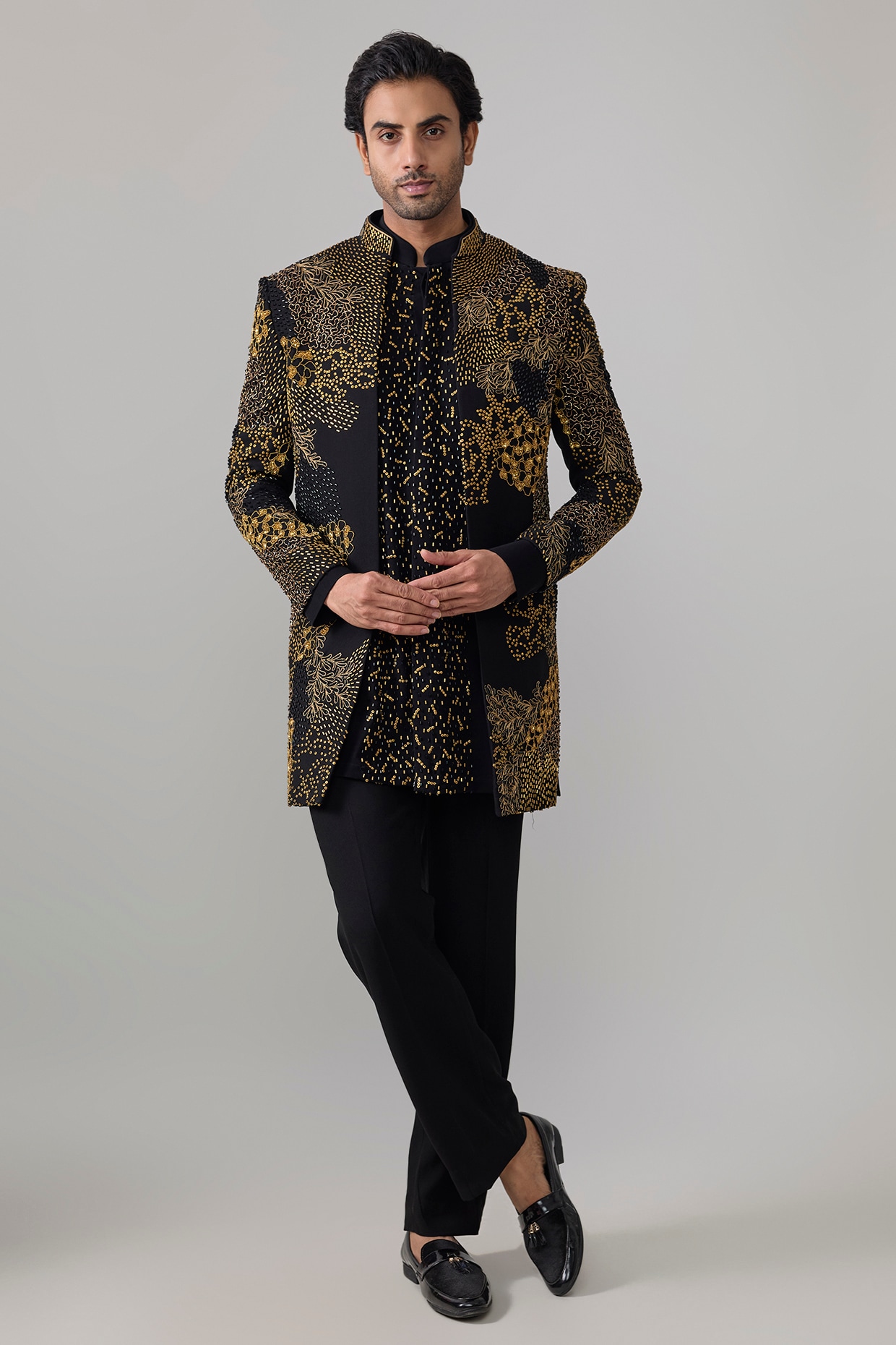 Jayesh and Kaajal Shah Black Suiting Indowestern Jacket Set