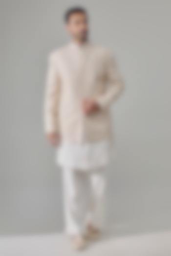 Cream Raw Silk Groom Indowestern Set by Jayesh and Kaajal Shah Men at Pernia's Pop Up Shop