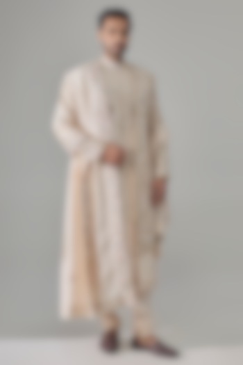 Ivory Raw Silk Groom Sherwani Set by Jayesh and Kaajal Shah Men at Pernia's Pop Up Shop