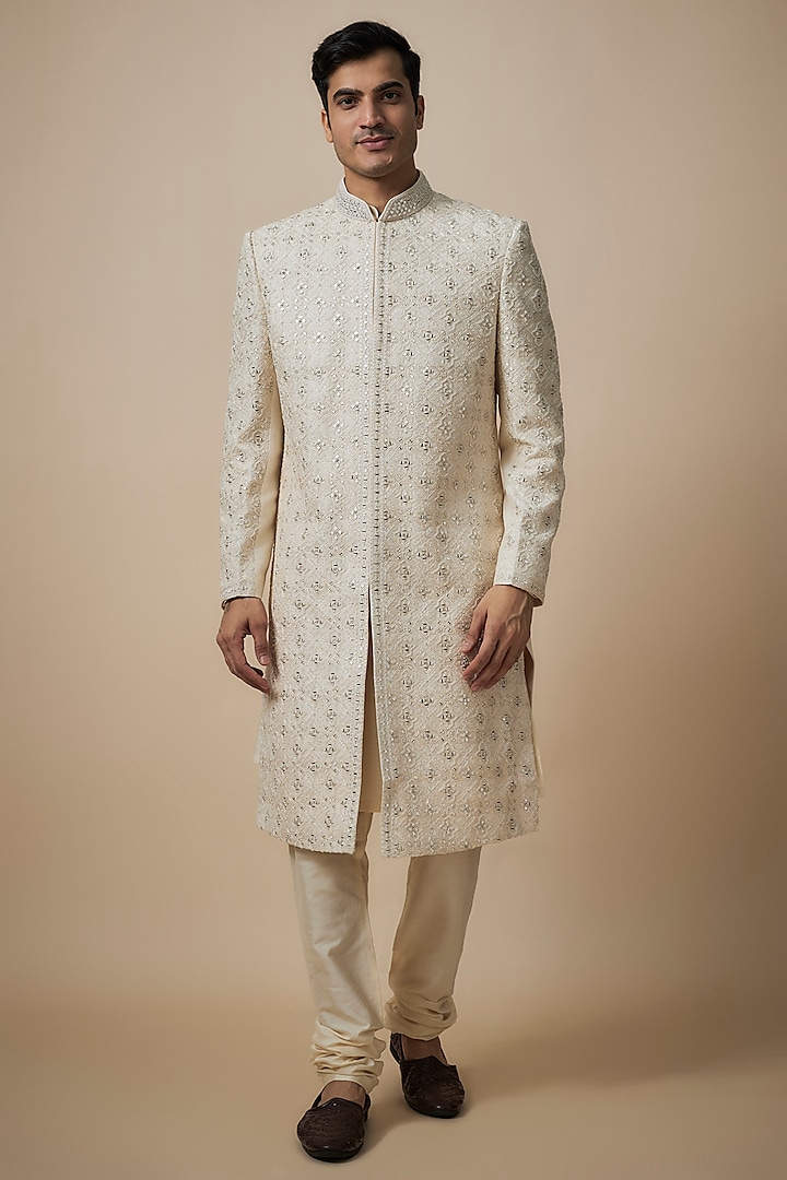 Gold Silk Sherwani Set by Jayesh and Kaajal Shah