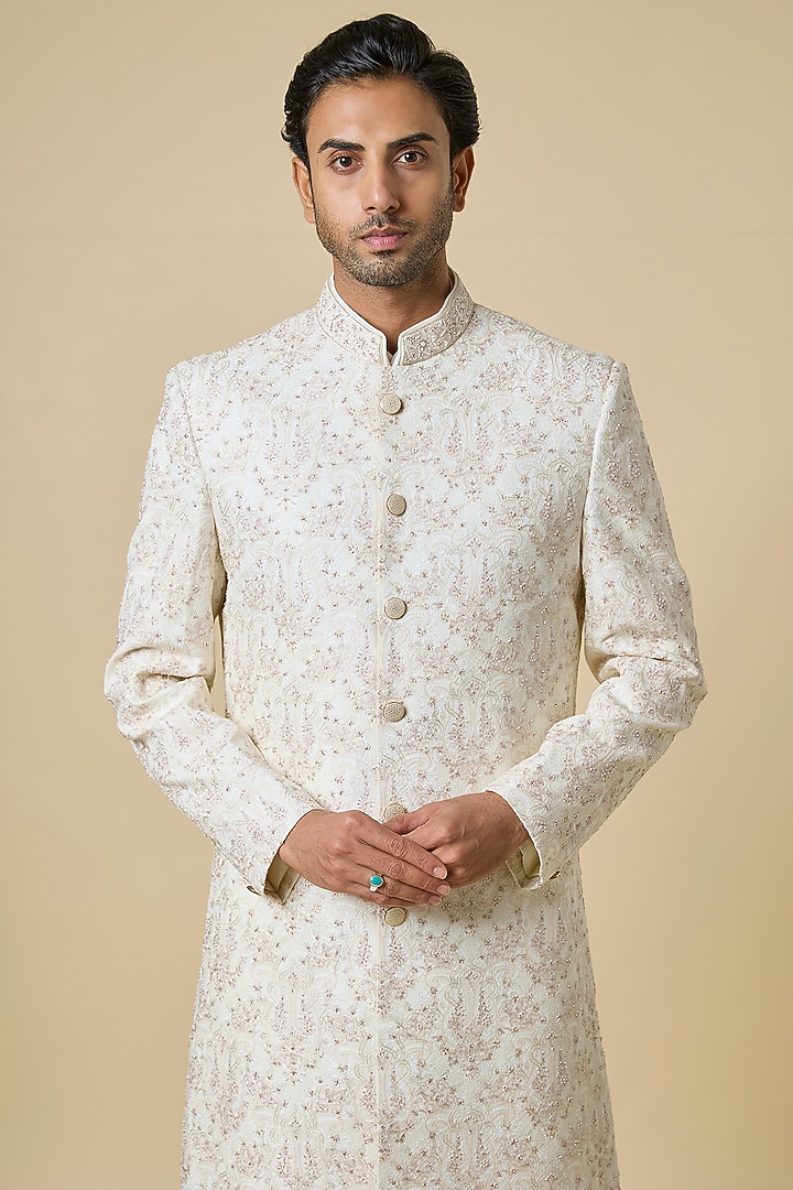 Cream Silk Embroidered Groom Sherwani Set by Jayesh and Kaajal Shah Men at Pernia's Pop Up Shop