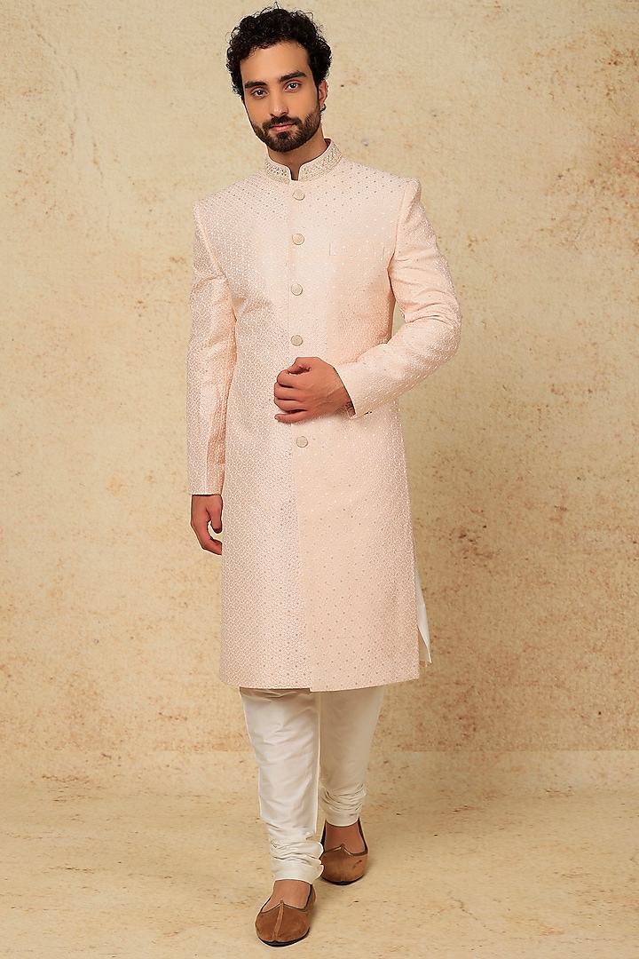 Blush Pink Machine & Hand Embroidered Sherwani Set by Jayesh and Kaajal Shah