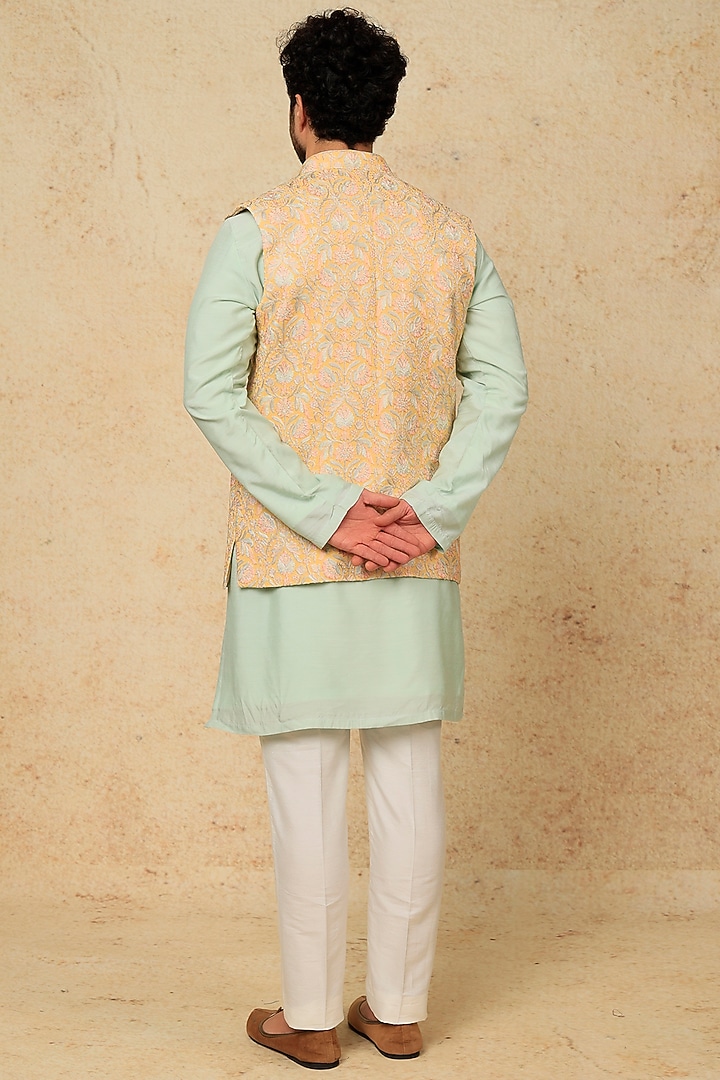 Mint Blue Modal Cotton Kurta Set With Yellow Bundi Jacket by Jayesh and Kaajal Shah Men at Pernia's Pop Up Shop