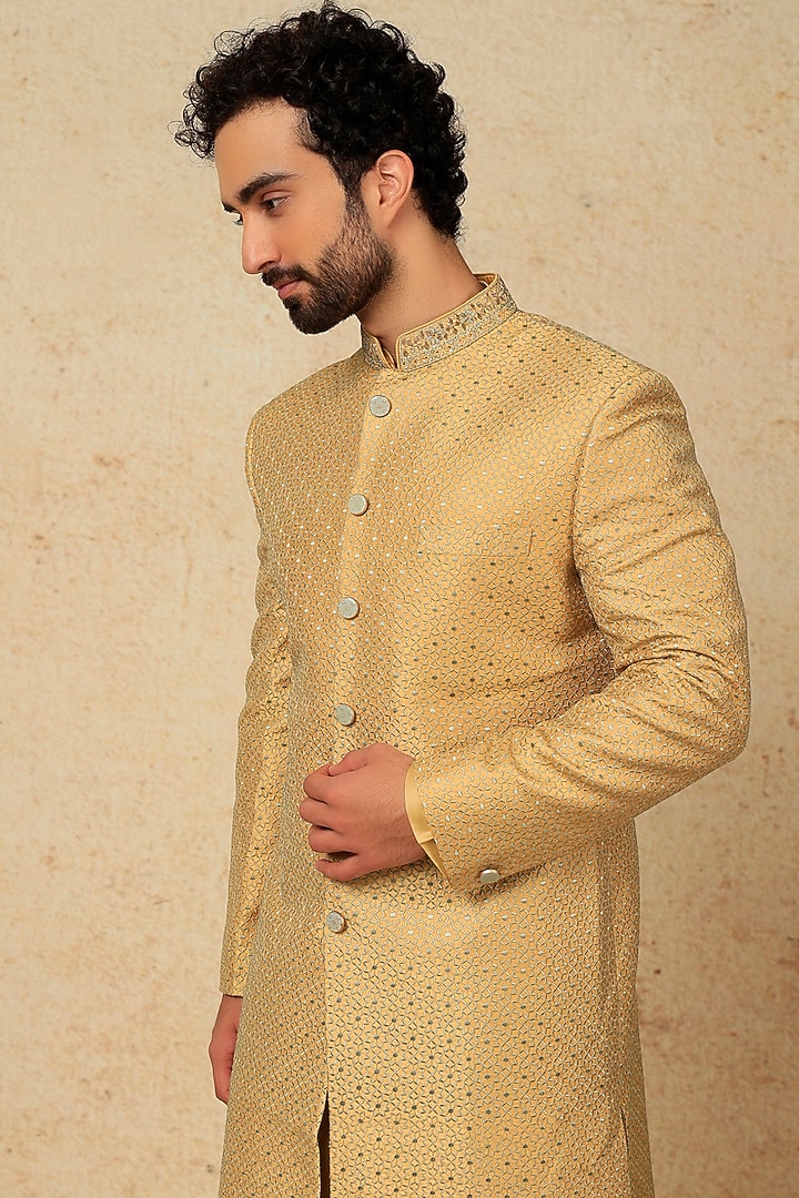 Gold Silk Hand & Machine Embroidered Wedding Sherwani Set by Jayesh and Kaajal Shah Men at Pernia's Pop Up Shop