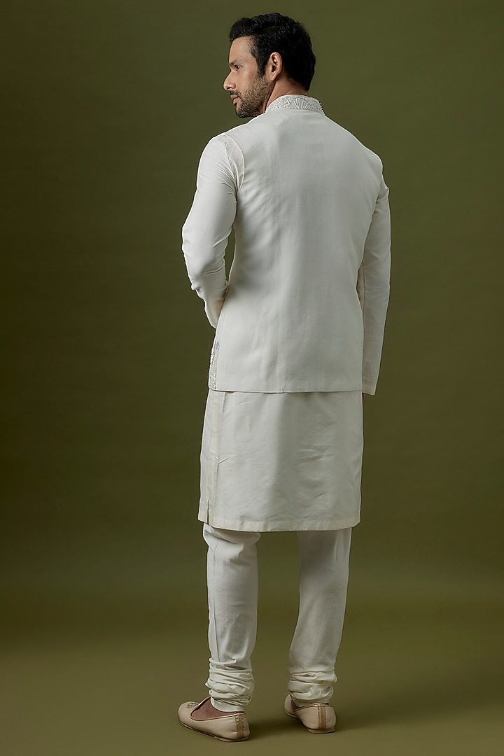 White Silk Thread Embroidered Nehru Jacket by Jayesh and Kaajal Shah Men at Pernia's Pop Up Shop