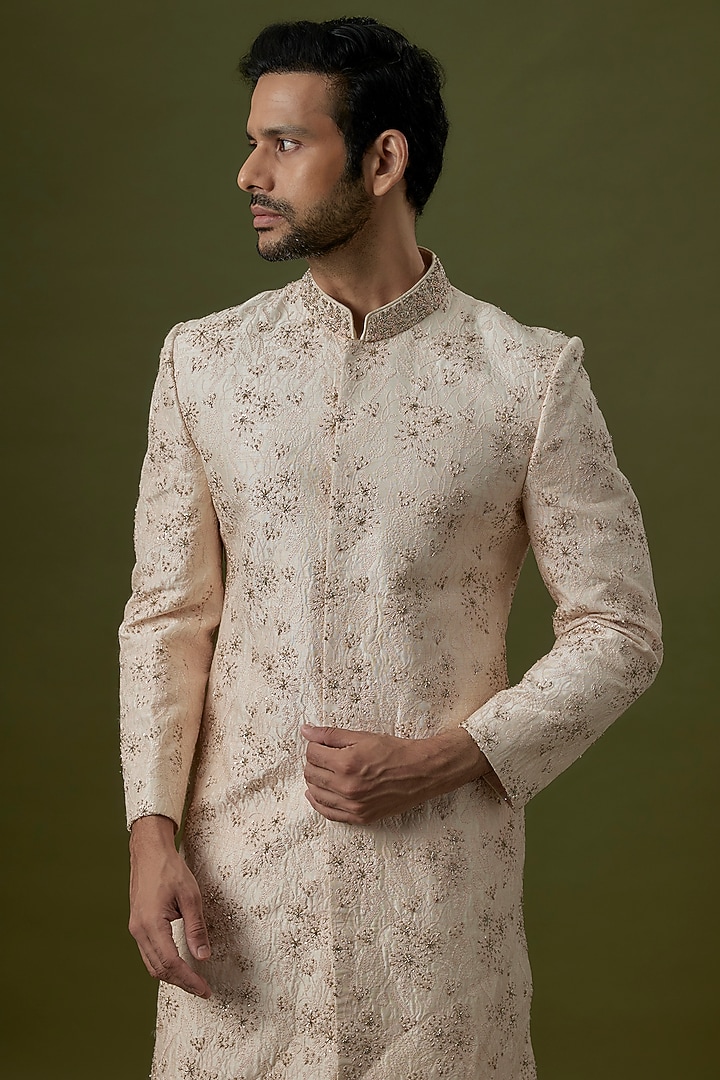 Ivory Silk Hand Embroidered Wedding Sherwani by Jayesh and Kaajal Shah Men at Pernia's Pop Up Shop