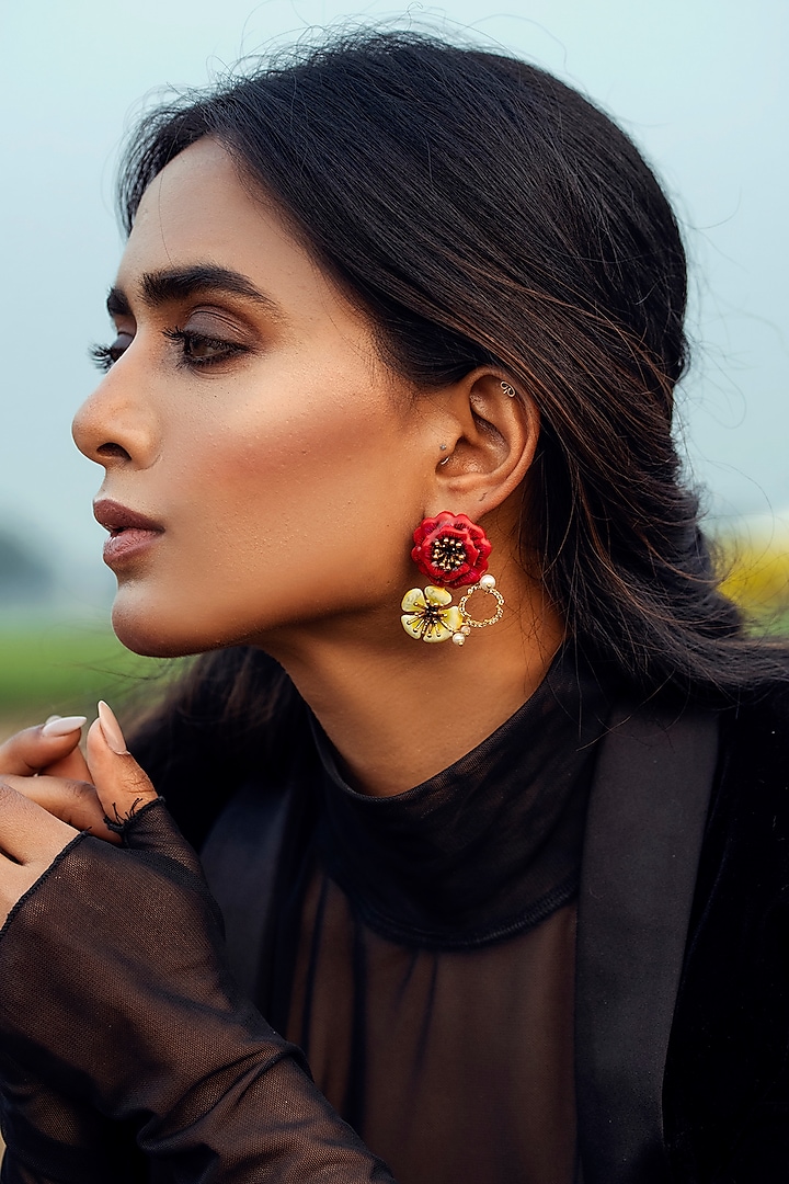 Gold Finish Pearl Floral Enameled Dangler Earrings by Jewellery by Astha Jagwani