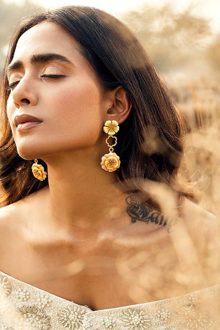 Gold Finish Enameled Floral Dangler Earrings by Jewellery by Astha Jagwani