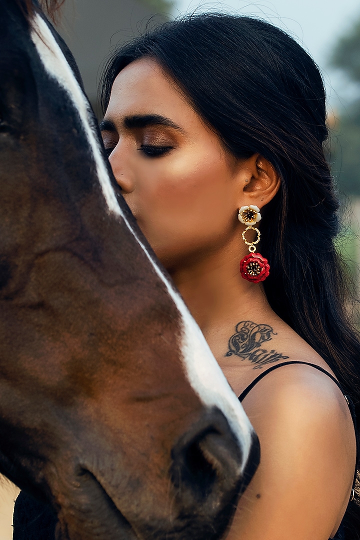Gold Finish Enameled Floral Dangler Earrings by Jewellery by Astha Jagwani at Pernia's Pop Up Shop