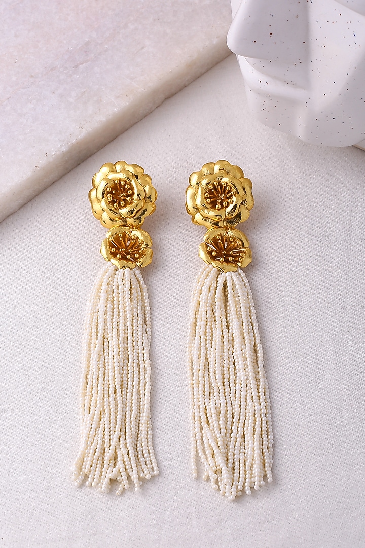 Gold Finish Pearl Dangler Earrings by Jewellery by Astha Jagwani at Pernia's Pop Up Shop