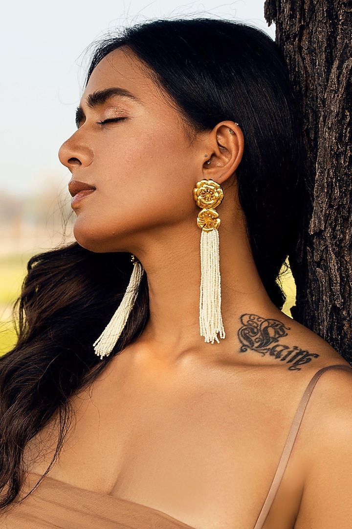 Gold Finish Pearl Dangler Earrings by Jewellery by Astha Jagwani at Pernia's Pop Up Shop