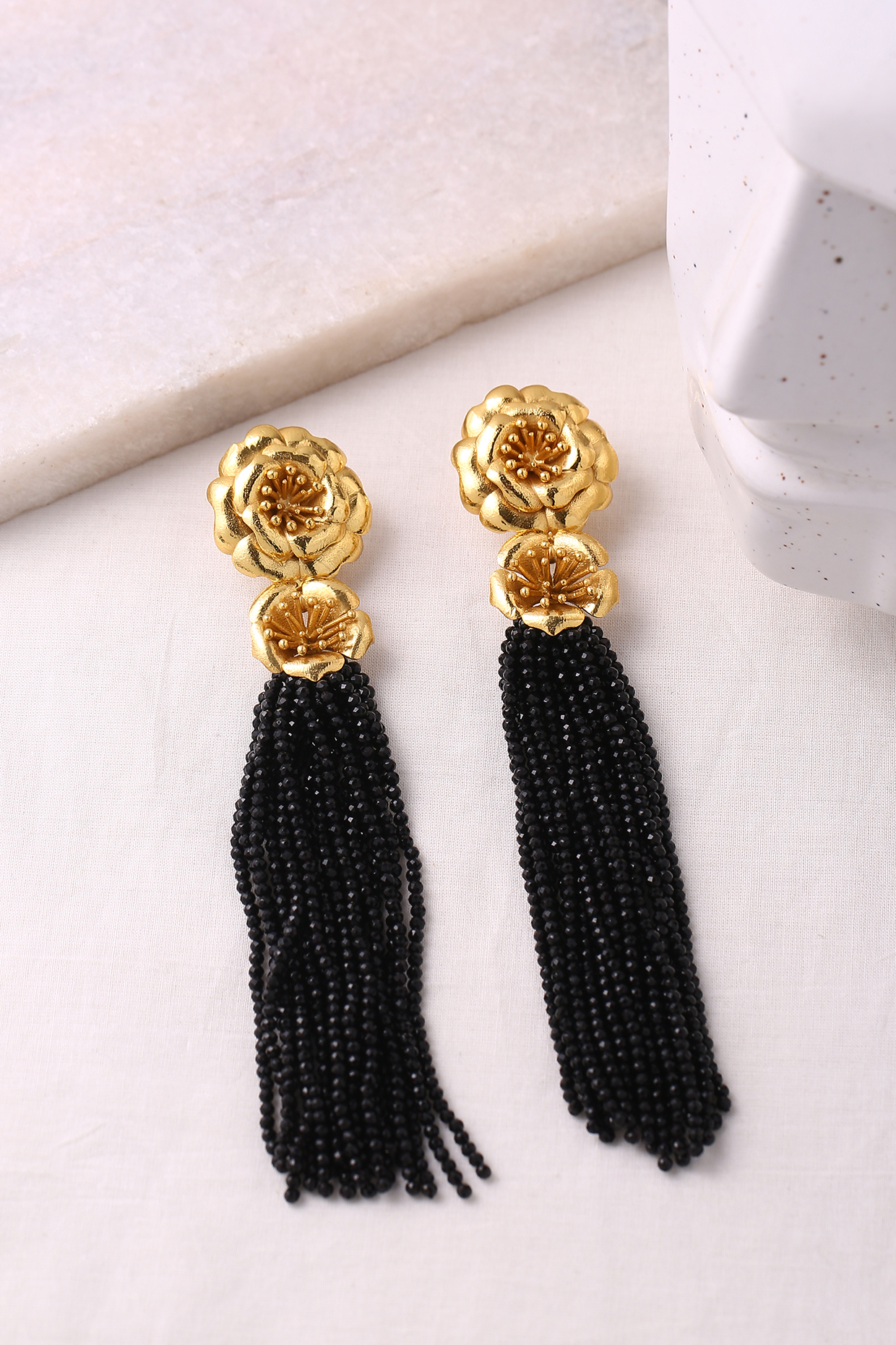 Gold Finish Pearl Dangler Earrings by Jewellery by Astha Jagwani