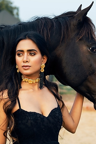Gold Finish Pearl Dangler Earrings by Jewellery by Astha Jagwani