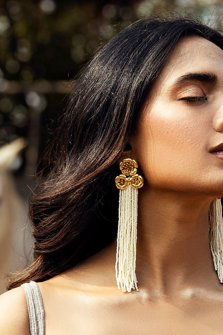 Gold Plated White Tassel Dangler Earrings by Jewellery by Astha Jagwani at Pernia's Pop Up Shop