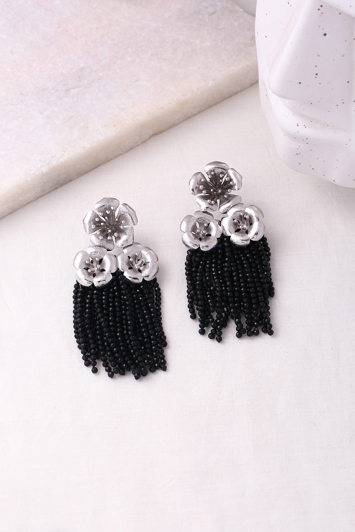 Gold Plated Black Tassel Dangler Earrings by Jewellery by Astha Jagwani